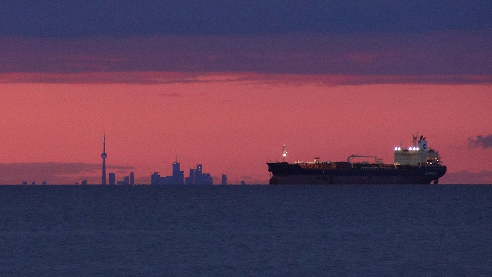Nautical twilight. The human eye can see general outlines but cannot make out details.