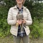October 12, 2022: A bander-in-training with the peregrine falcon she captured.