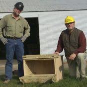 RRP Founder Bob Anderson and Dairyland Power Biologist John Thiel with a nestbox