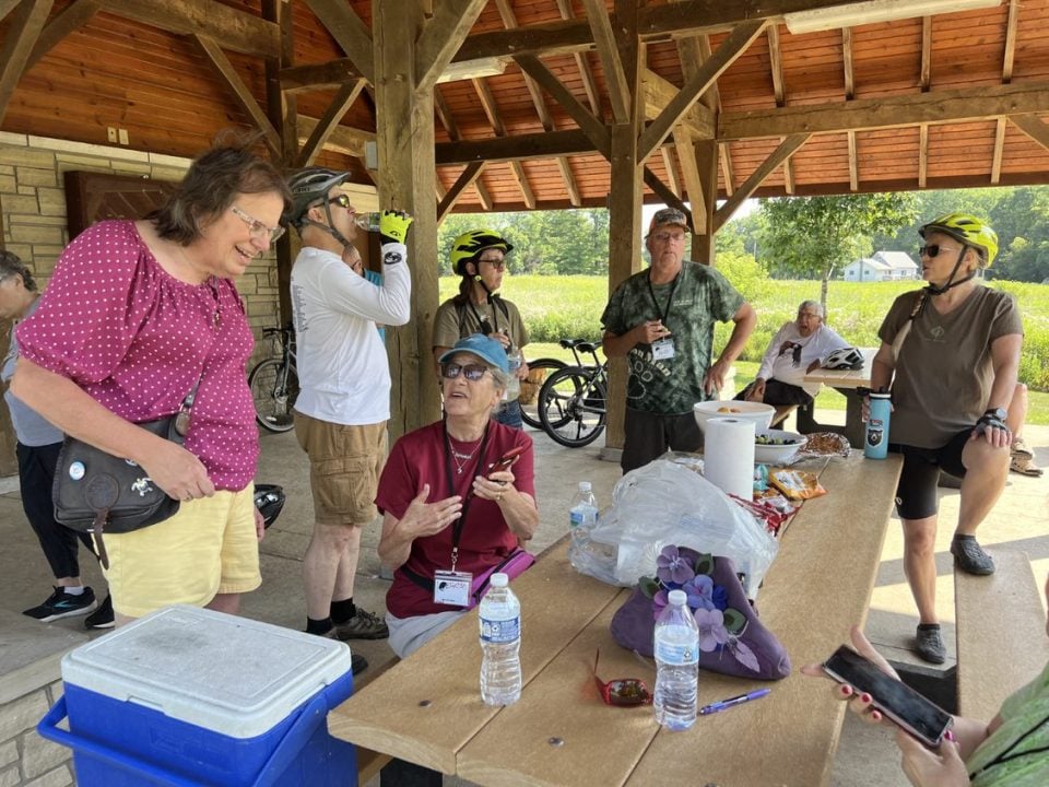 Riders at the pavilion. Snacks are included at almost all of our activities, and water is a must!